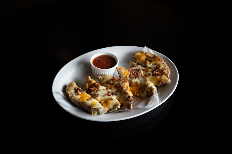 Breadsticks with marinara dipping sauce at Mod Pizza